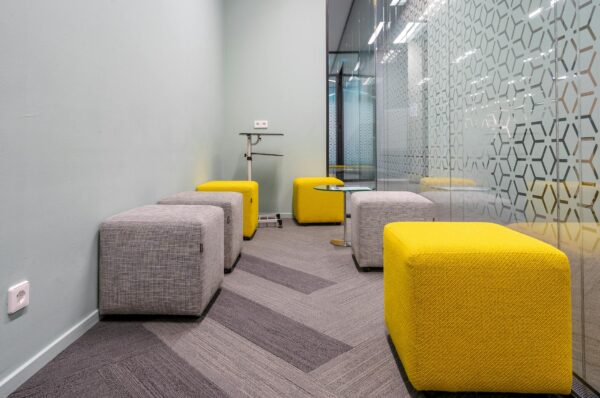 squared stools inside an office