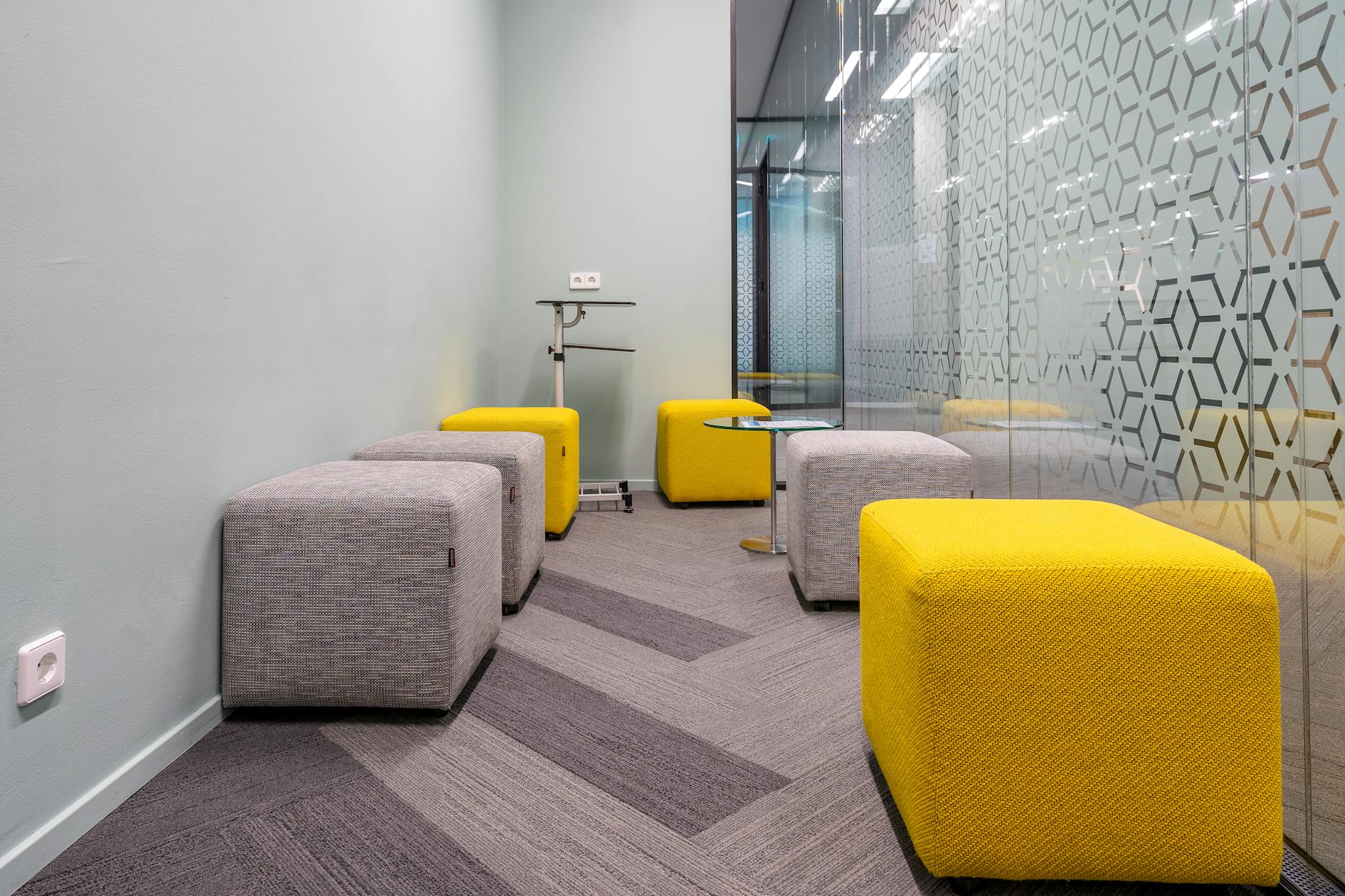 squared stools inside an office